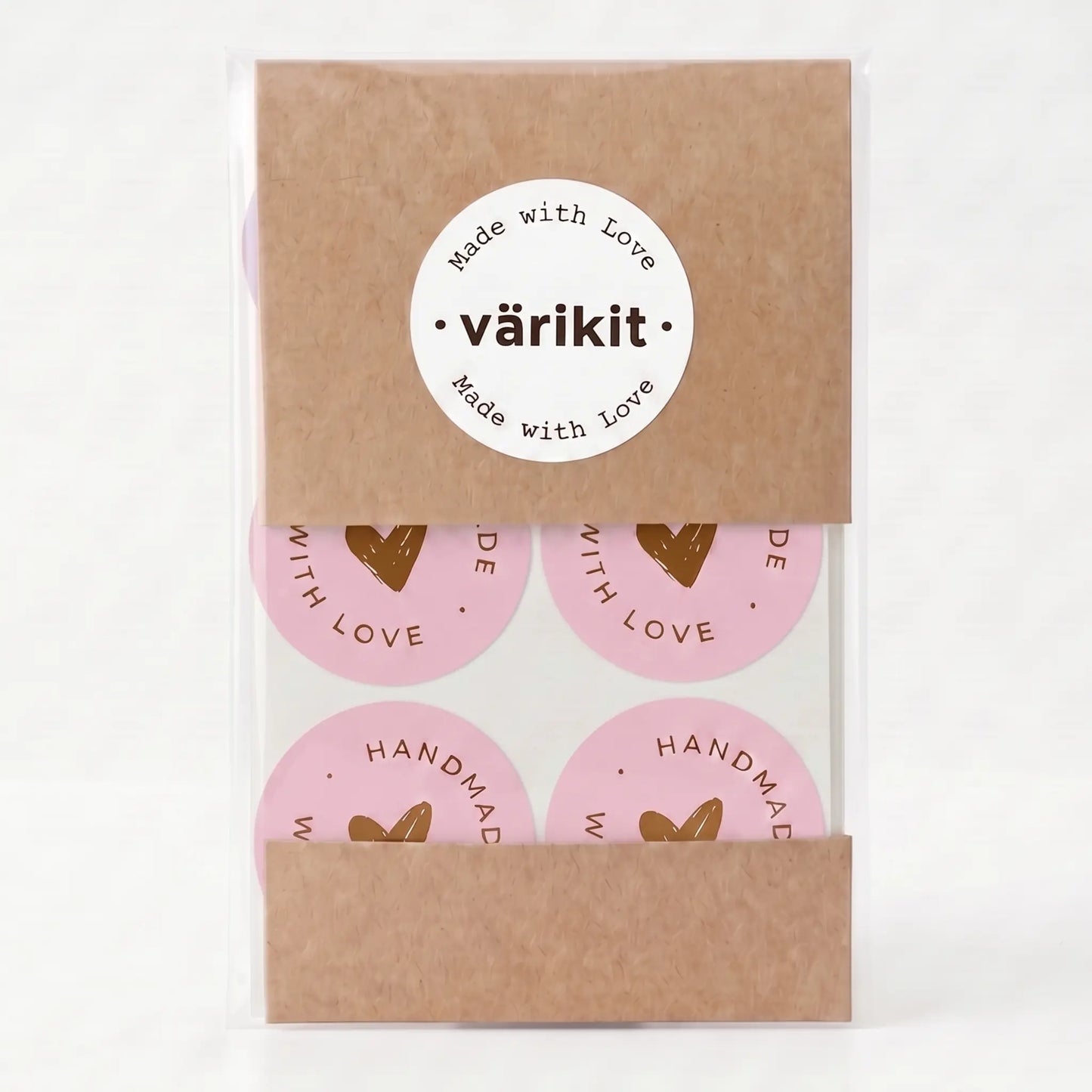 Handmade with love sticker with scribbled heart script design in pink and coffee