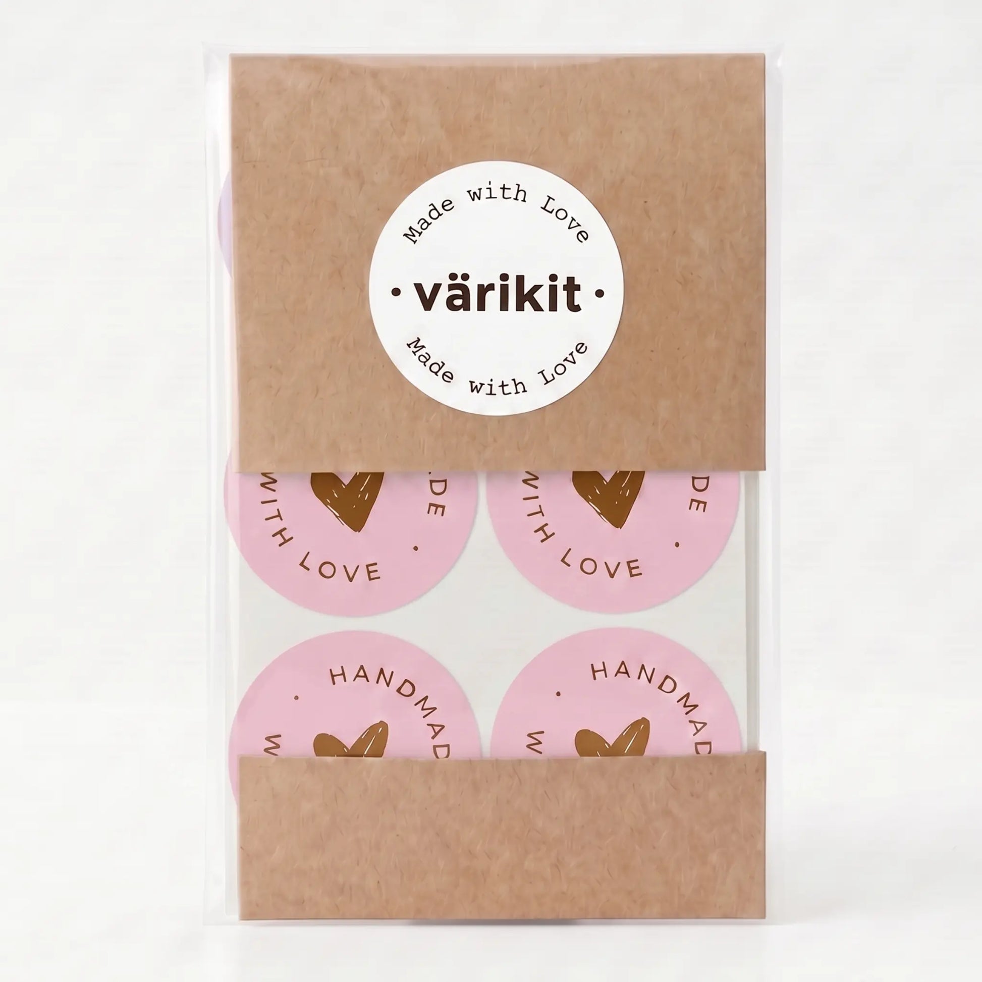 Handmade with love sticker with scribbled heart script design in pink and coffee