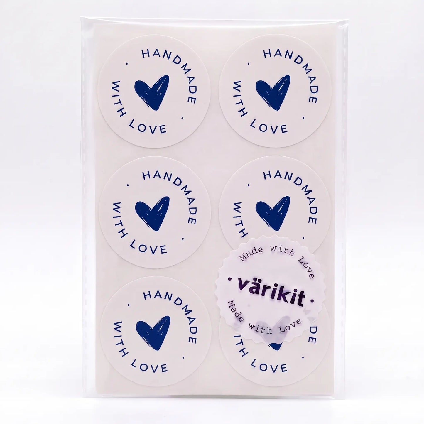 White and blue scribbled heart handmade with love sticker