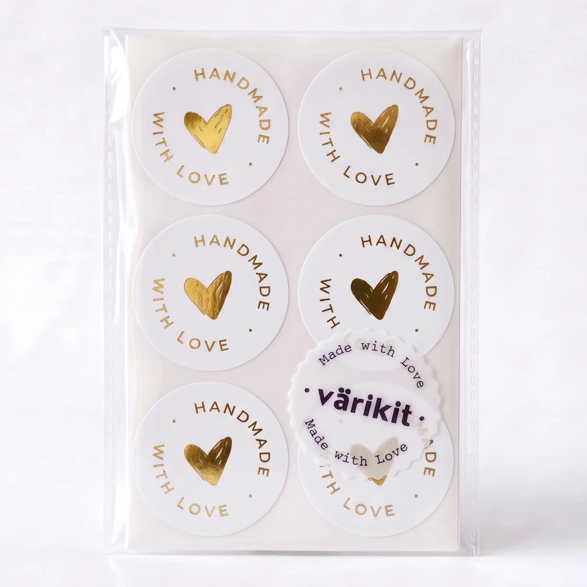 Round handmade with love label with scribbled heart script design