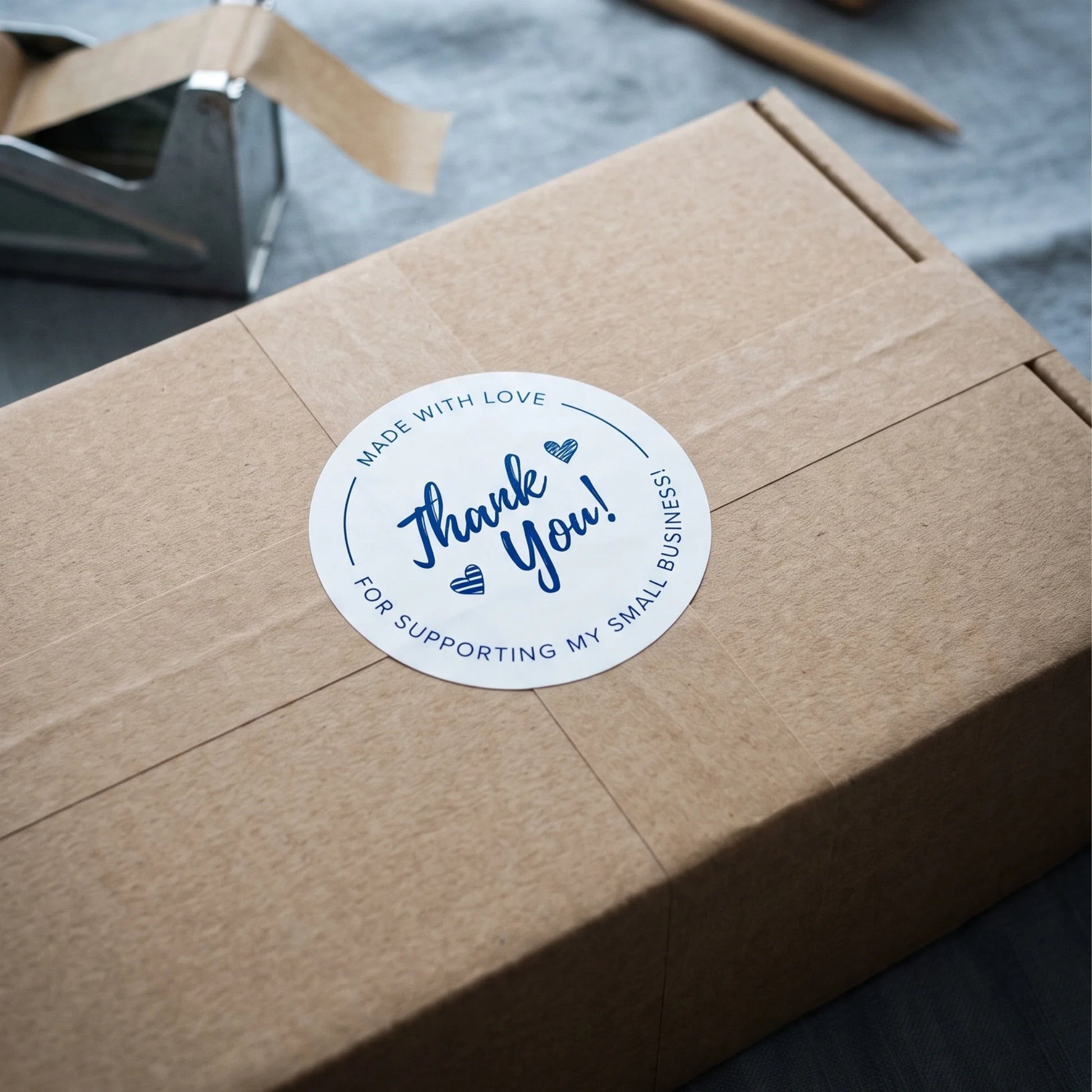 Round 2-inch handwritten cursive label created for independent order packing.