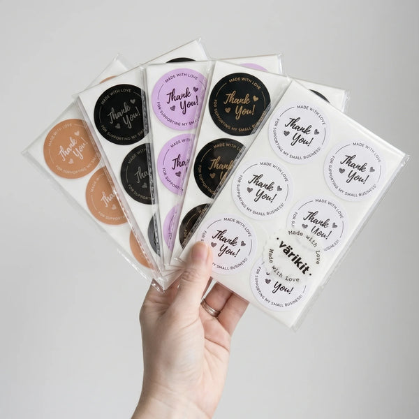 Add a handwritten double heart detail to boutique gifts with this paper label.