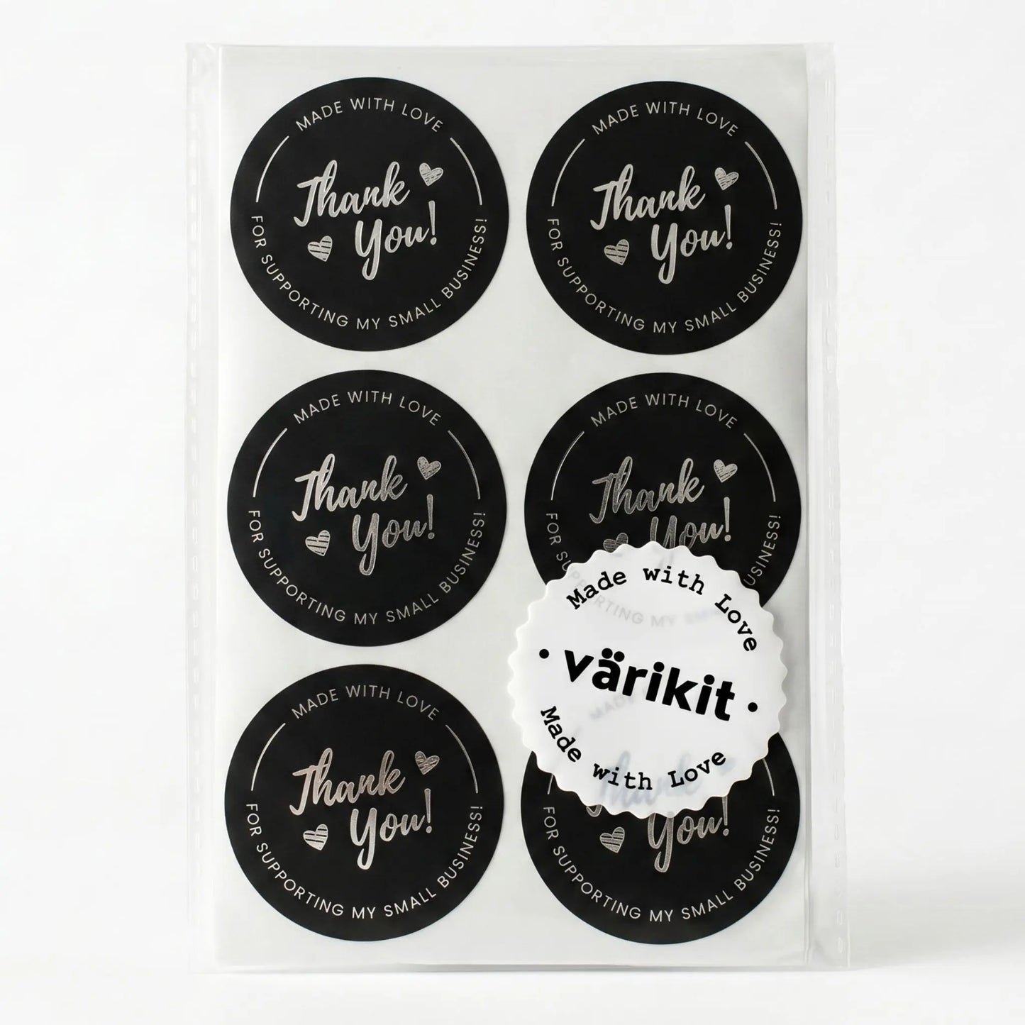 Thank you sticker with cursive script design in black and silver foil