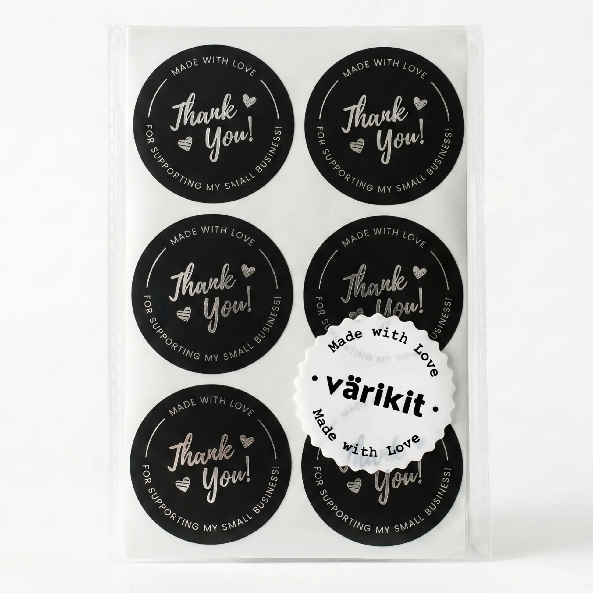 Thank you sticker with cursive script design in black and silver foil
