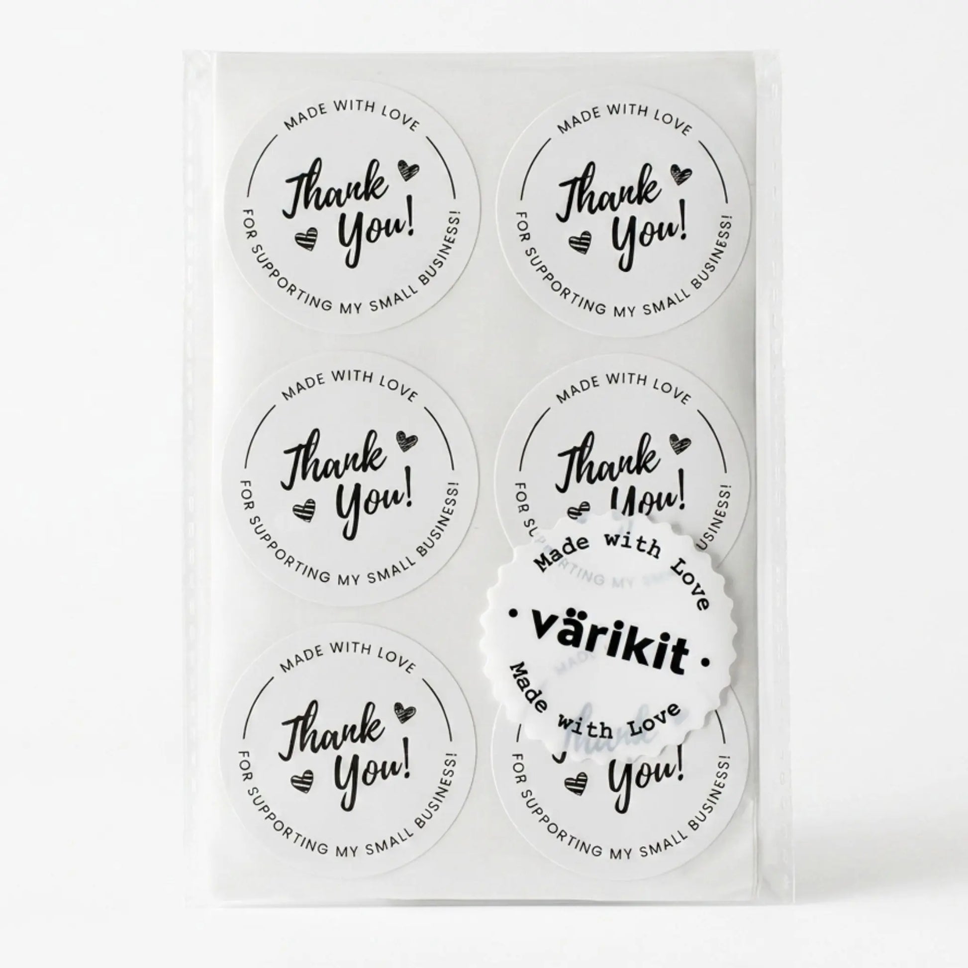 Thank you sticker with cursive script design in white and black