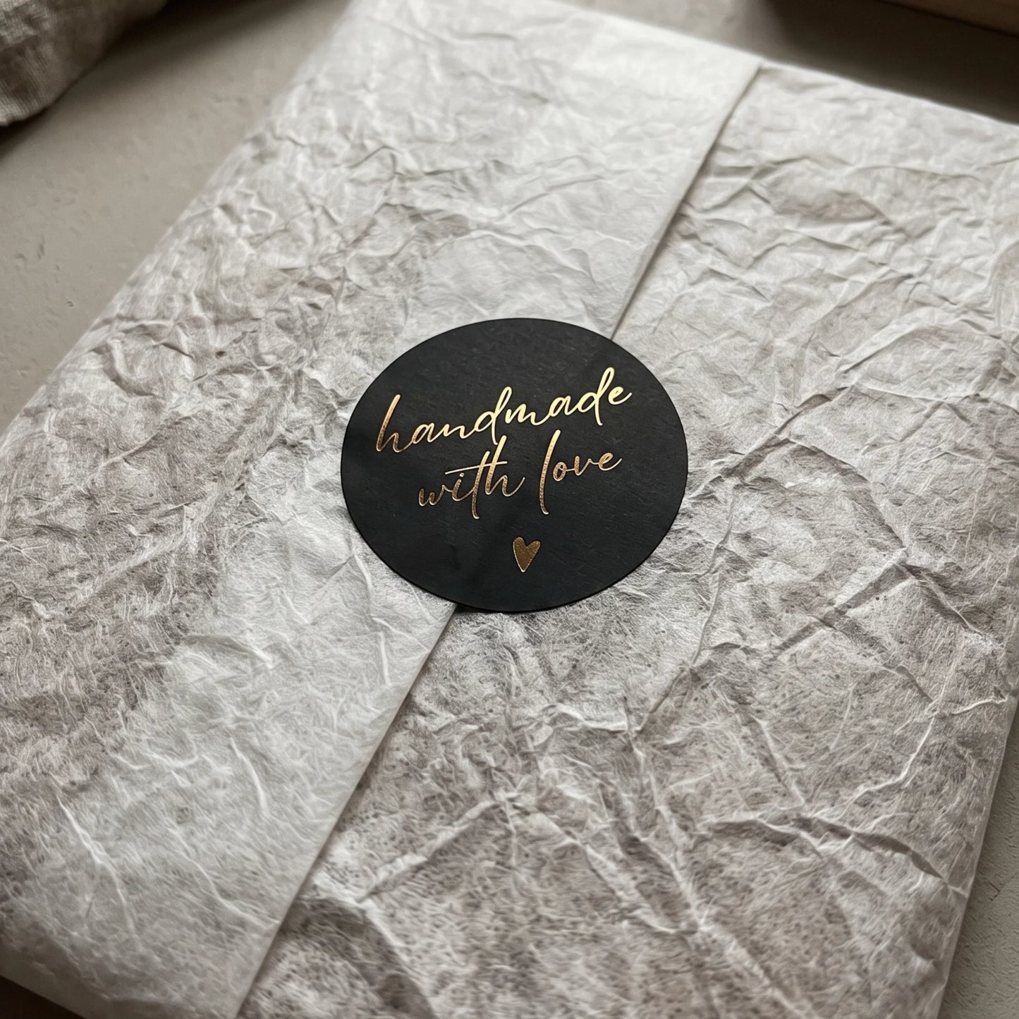 Round 2-inch handwritten label designed for daily small business fulfillment.