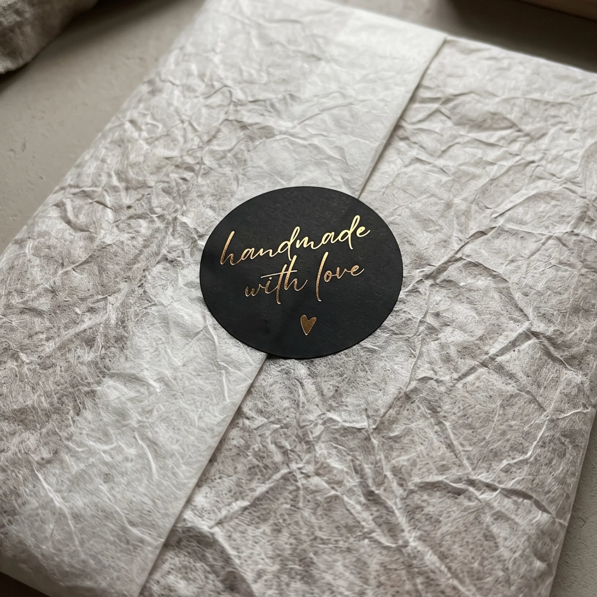 Round 2-inch handwritten label designed for daily small business fulfillment.