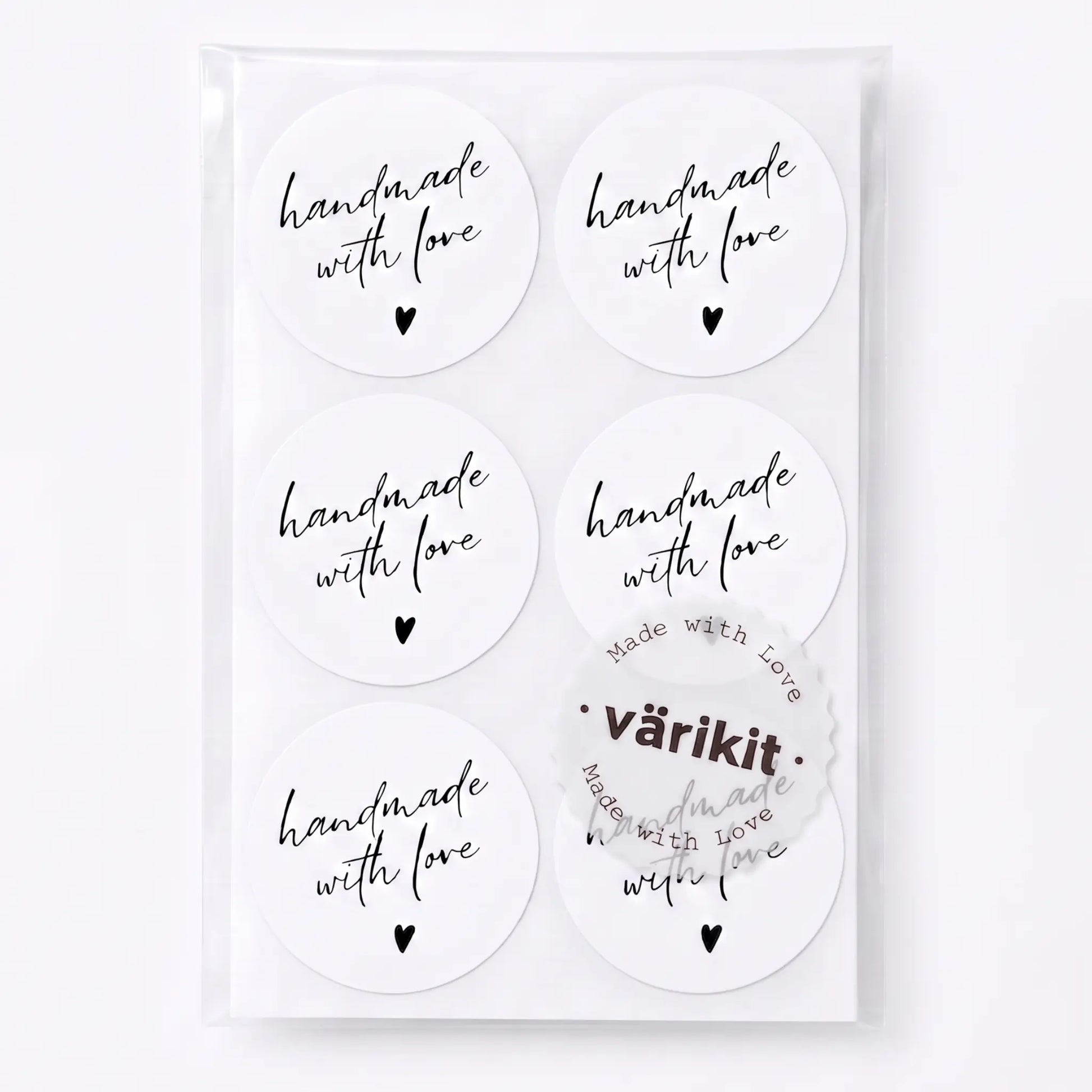 Handmade with love sticker with handwritten type script design in white and black