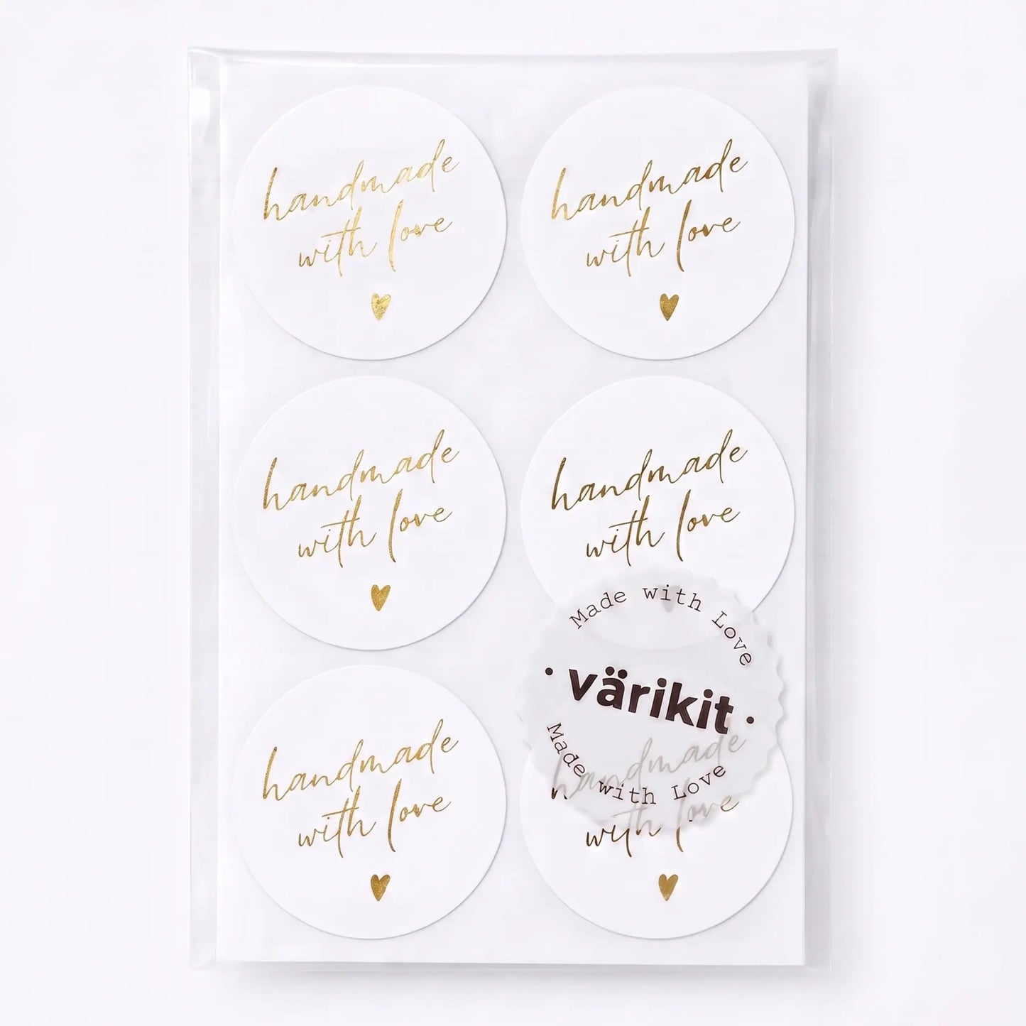 Handwritten type script handmade with love sticker in white and gold foil