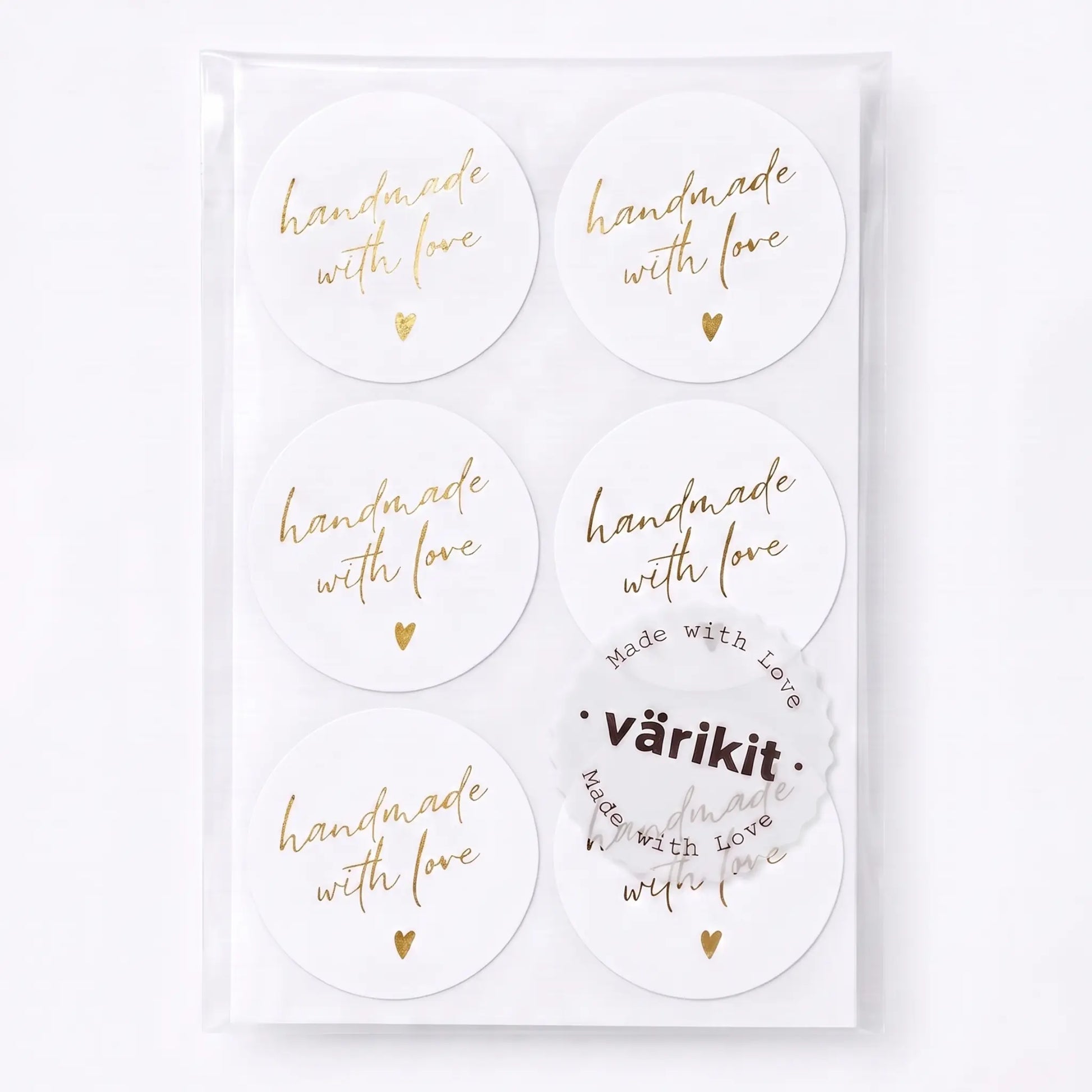 Handwritten type script handmade with love sticker in white and gold foil