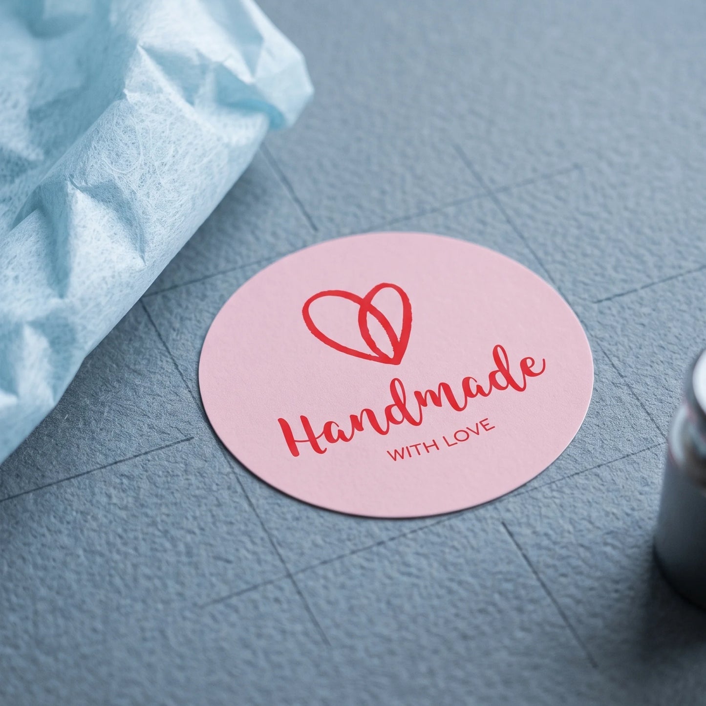Round 2-inch handwritten sticker created for independent brand fulfillment.