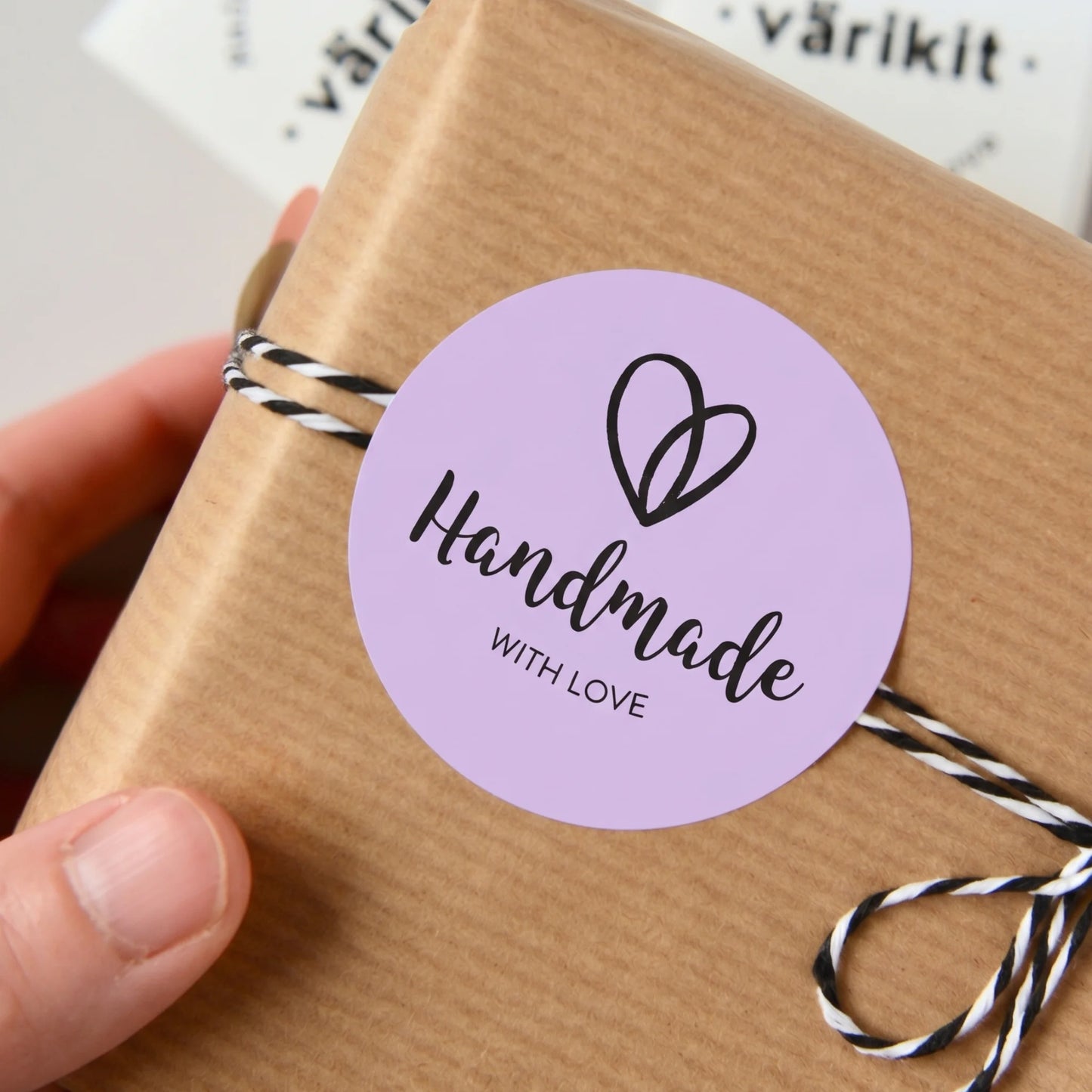 Purple handmade with Love sticker on a wrapped package
