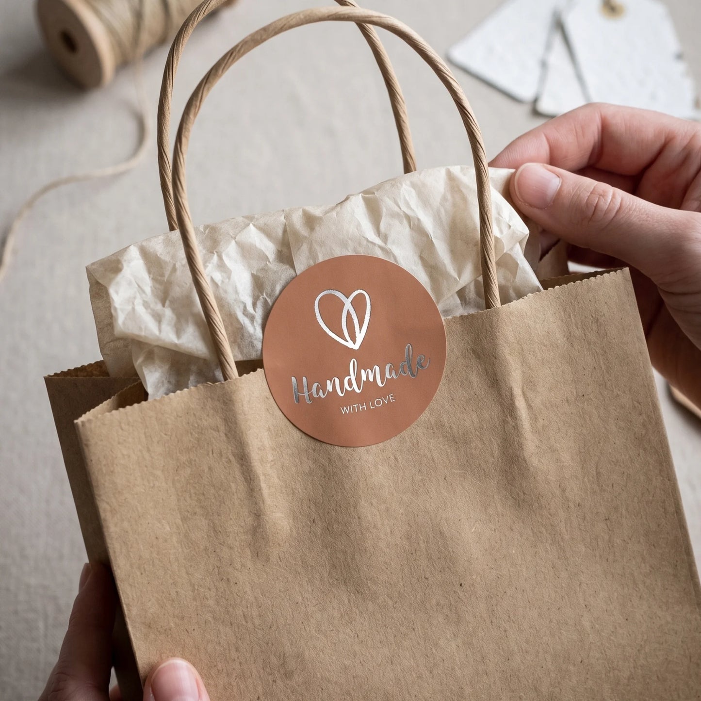 A hand-drawn heart label in handwritten style welcoming customers at unboxing.