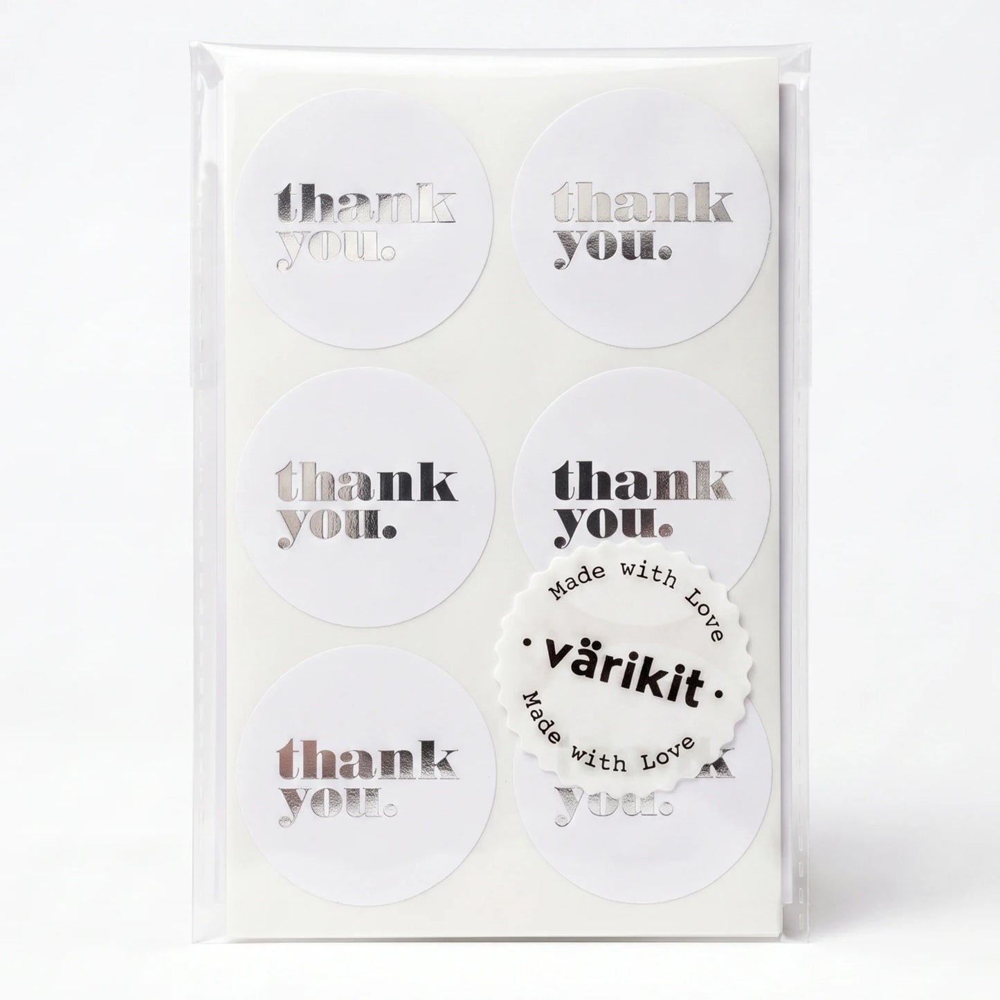 silver foil on white paper, 2-inch round simple business stickers, bold lowercase thank you type.