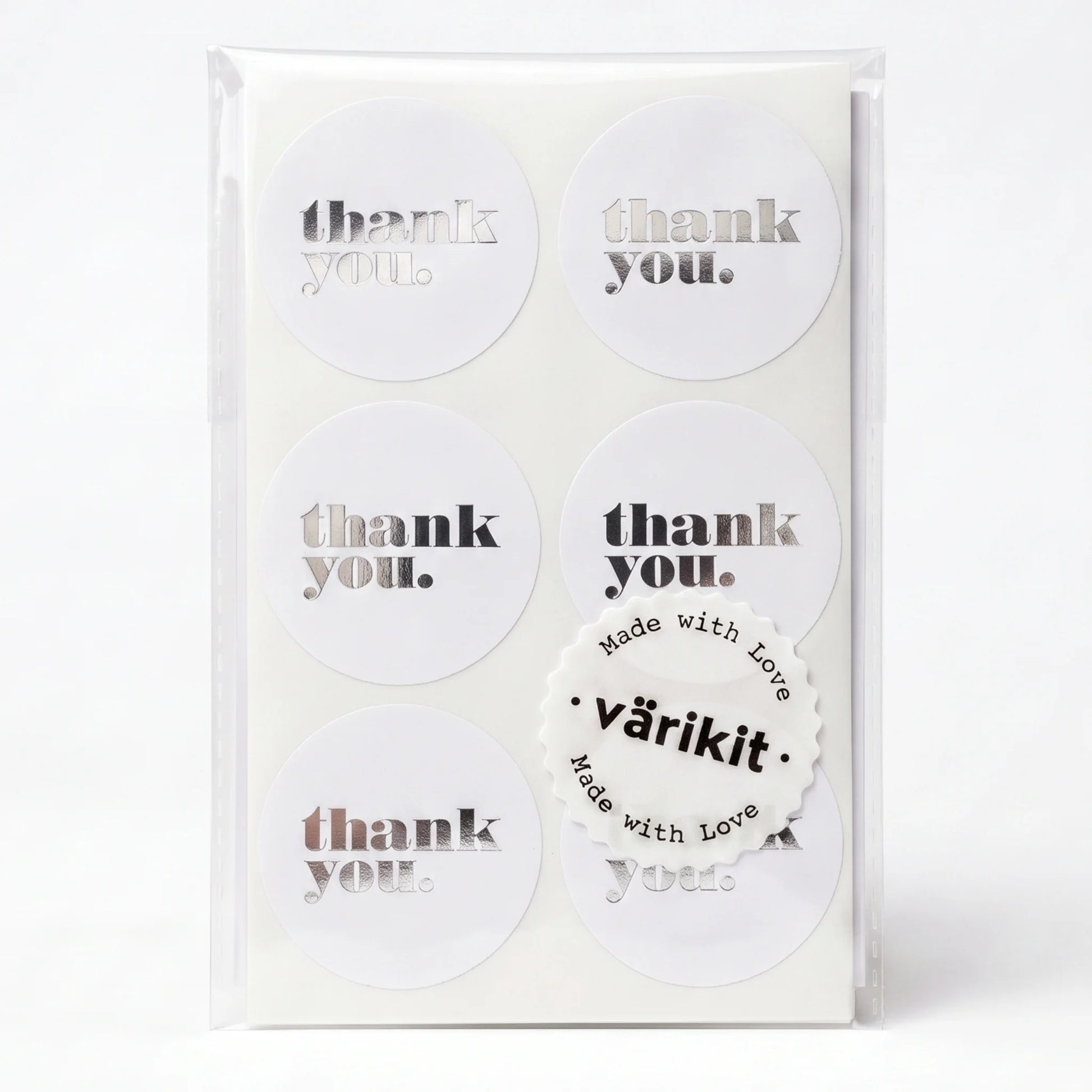 silver foil on white paper, 2-inch round simple business stickers, bold lowercase thank you type.