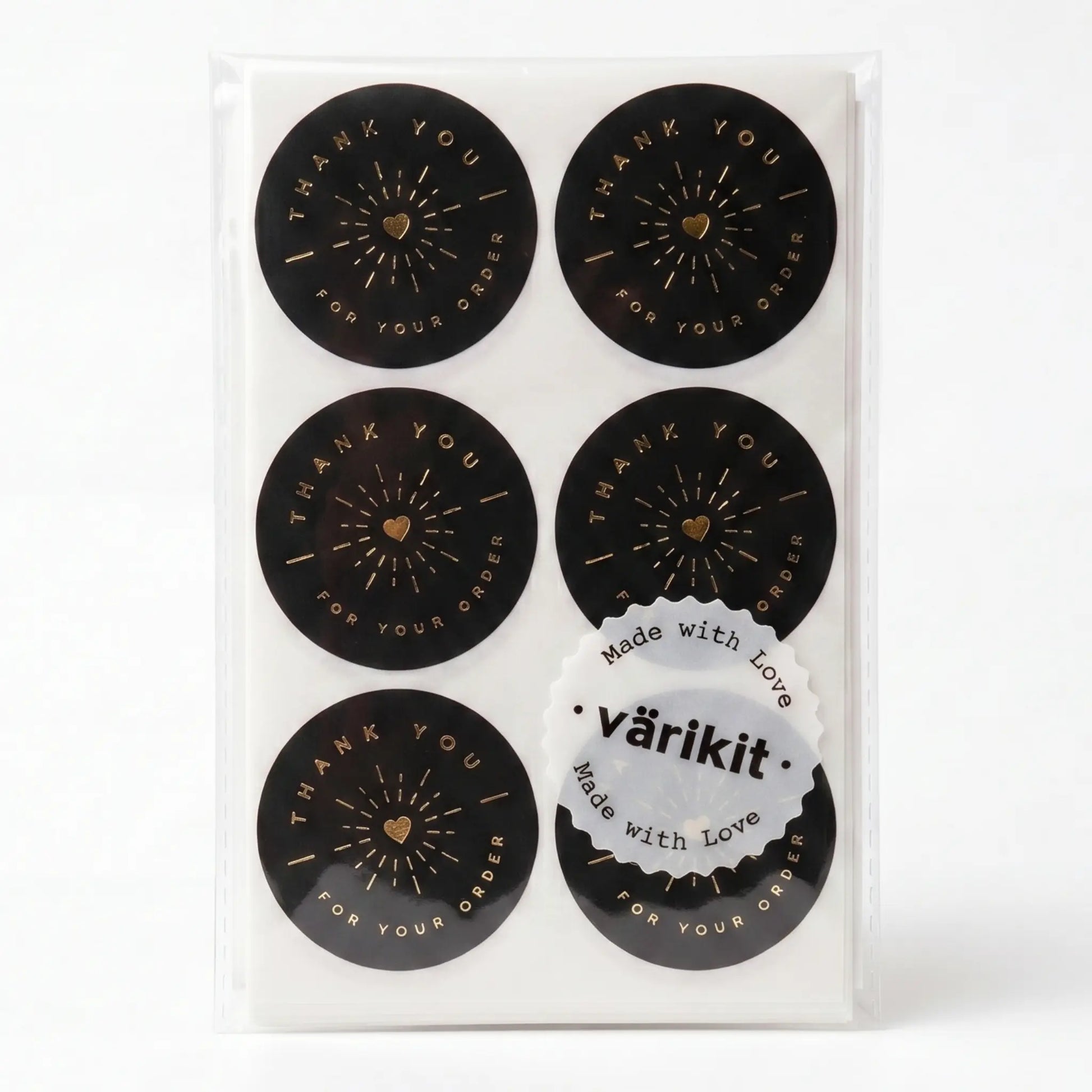 Black and gold foil radiant starburst thank you sticker