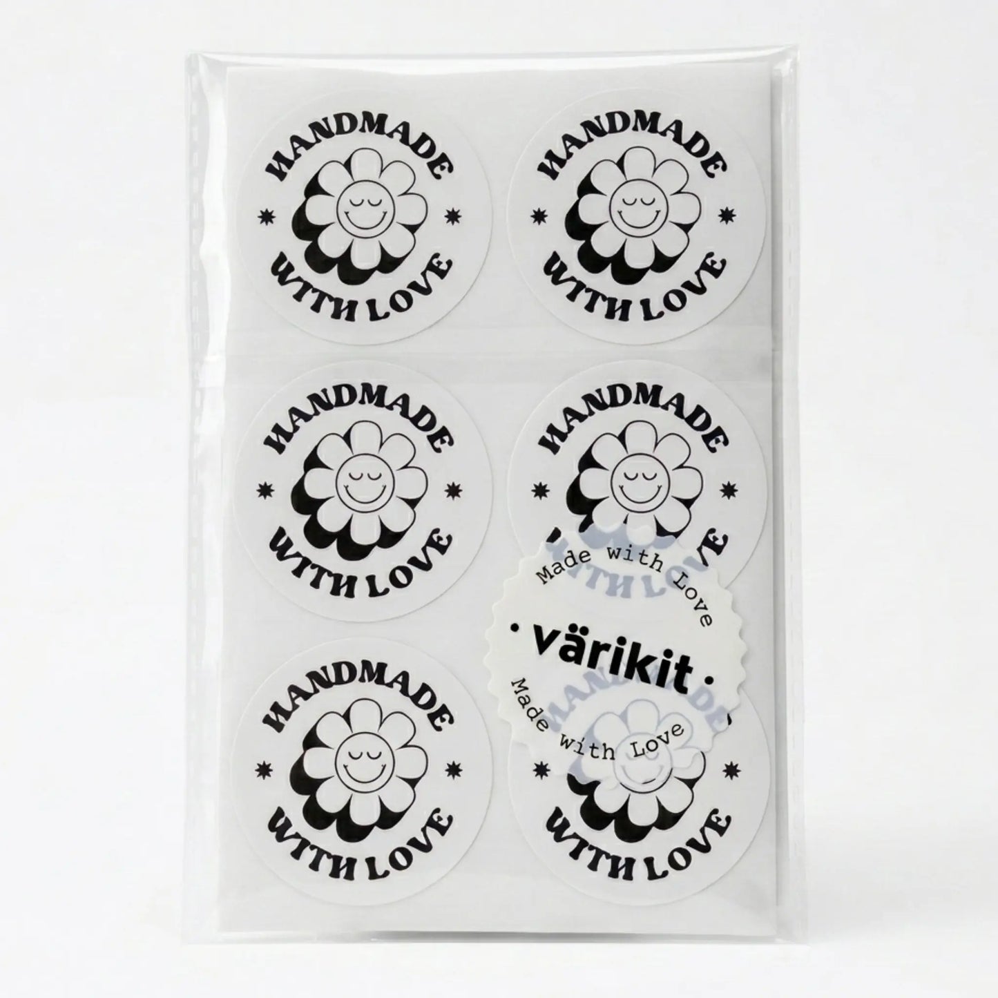 Handmade with love sticker with retro groovy daisy design in white and black