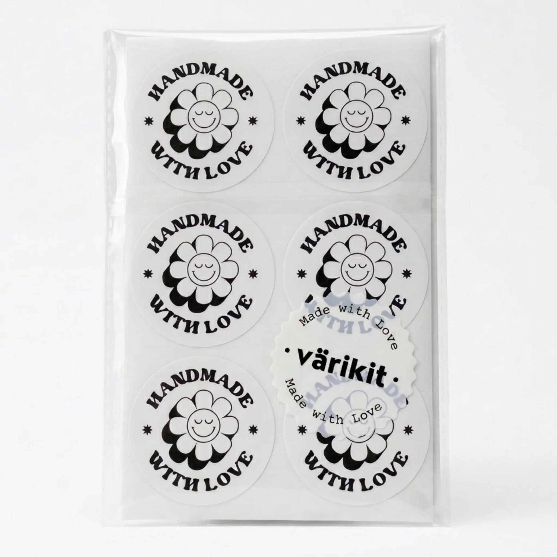 Handmade with love sticker with retro groovy daisy design in white and black