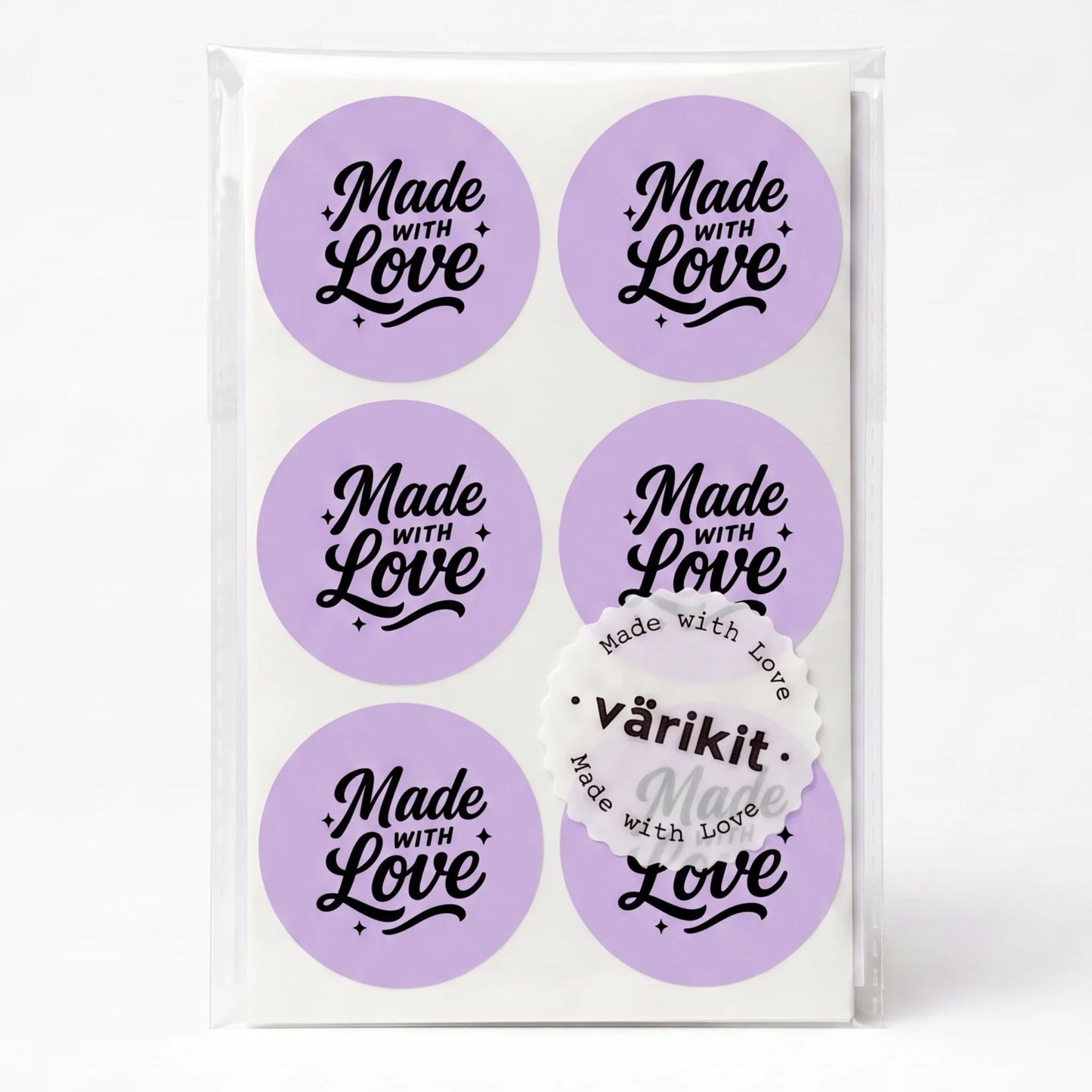 black ink on purple paper, 2-inch round vintage labels, spencerian script lettering.