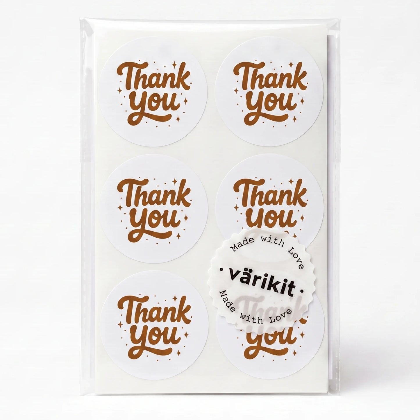coffee ink on white paper, 2-inch round retro style, vintage spencerian thank you script.