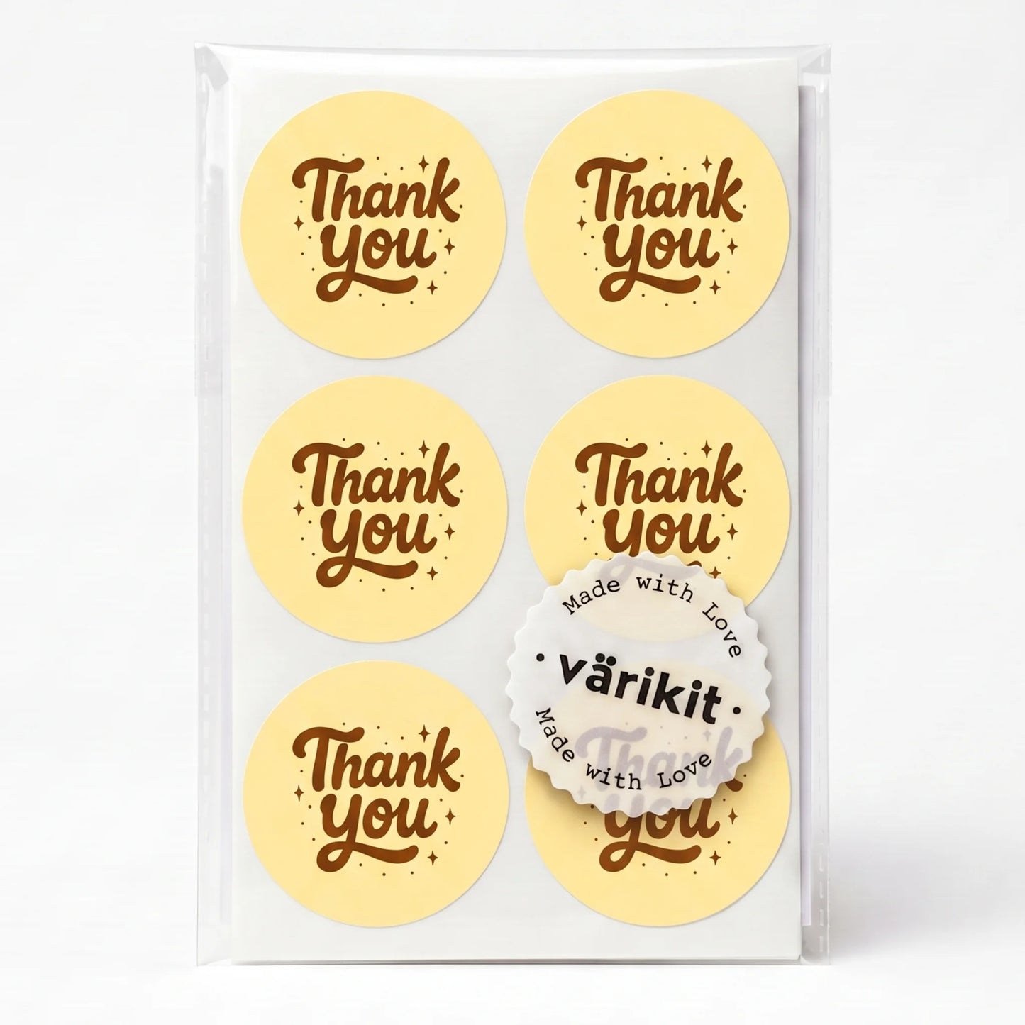 coffee ink on yellow paper, 2-inch round retro style, stars and dots accents.