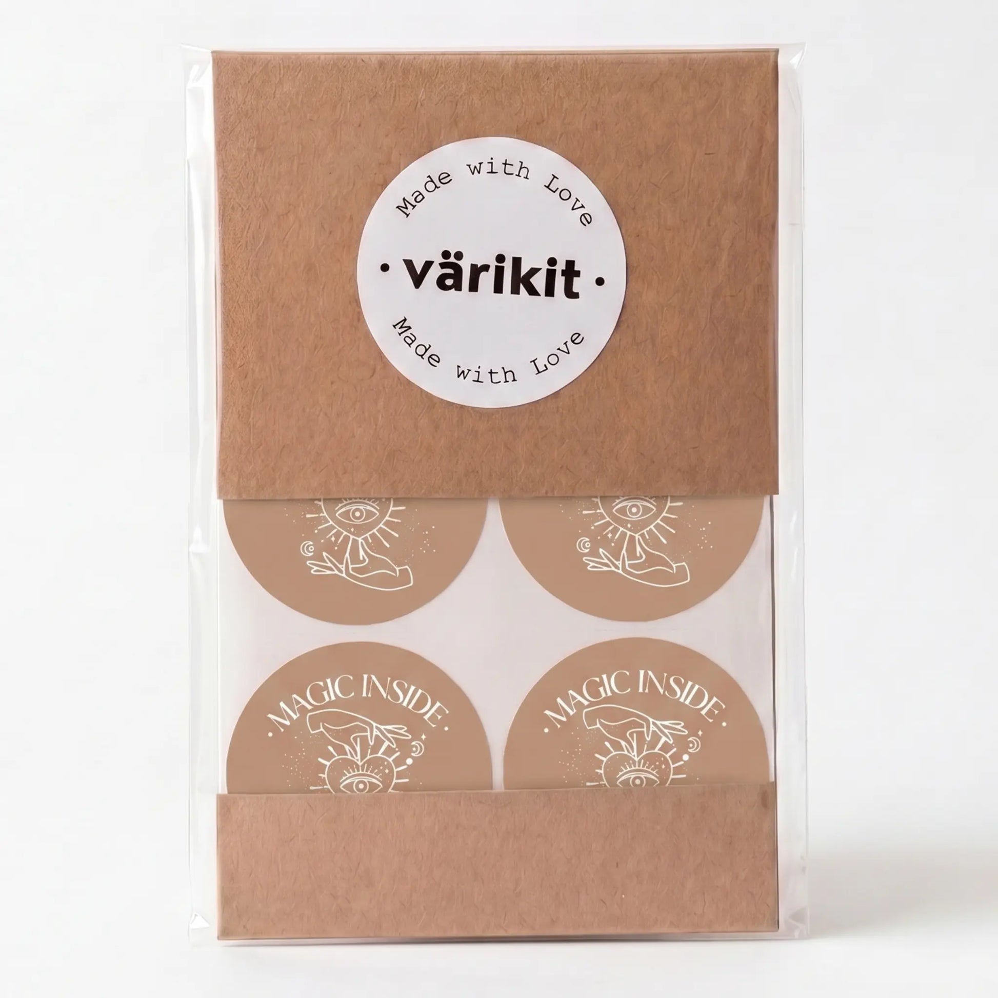 Round magic inside label with celestial hand and eye design
