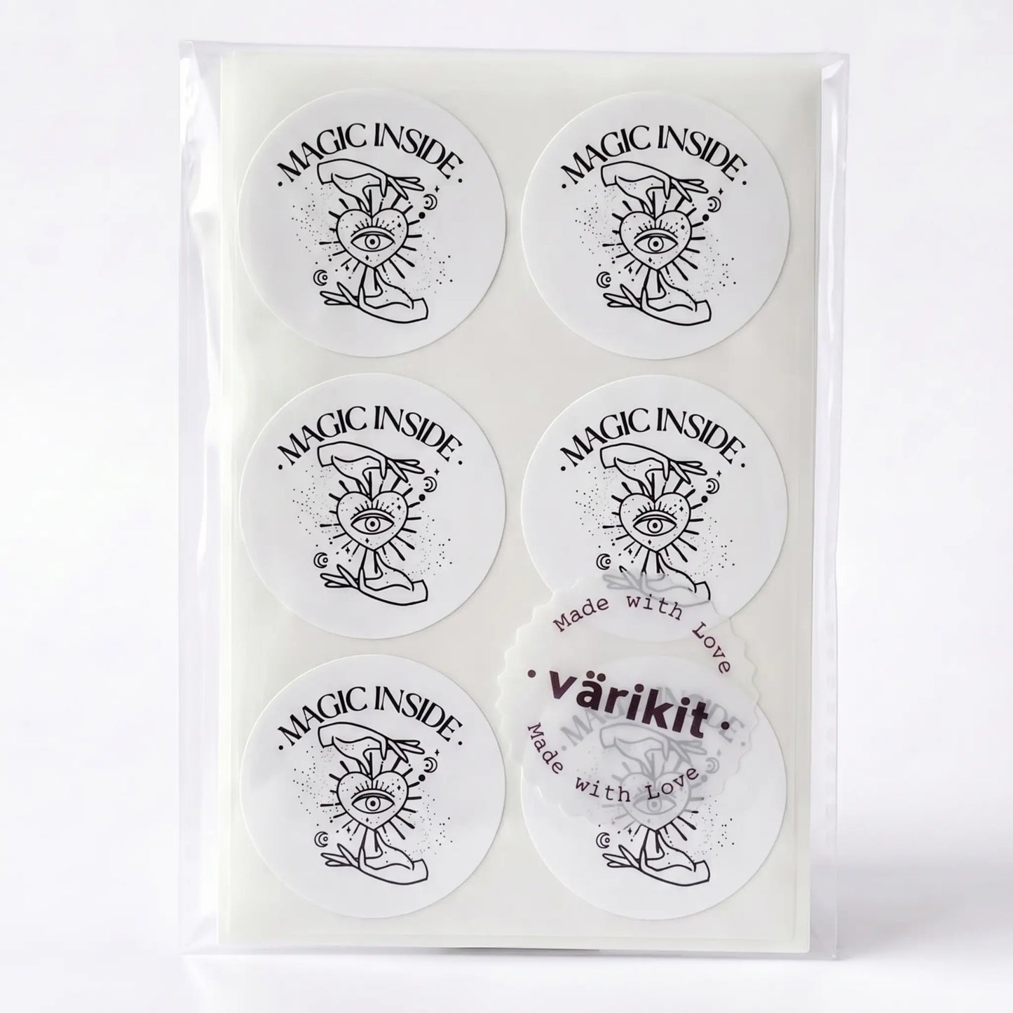 Magic inside sticker with celestial hand and eye design in white and black