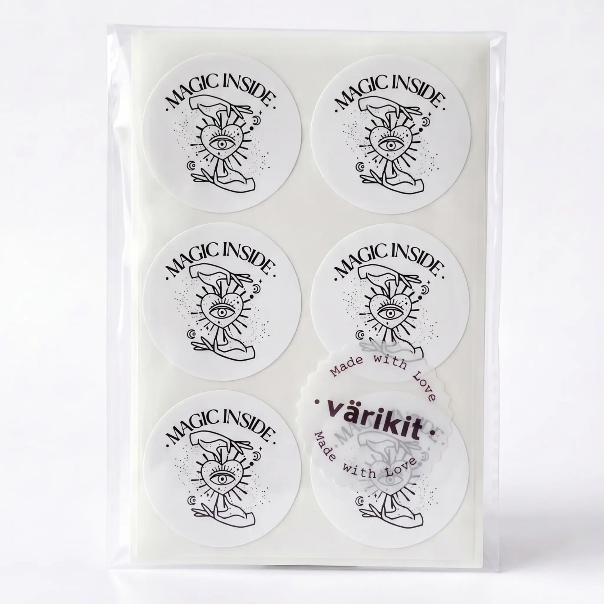 Magic inside sticker with celestial hand and eye design in white and black