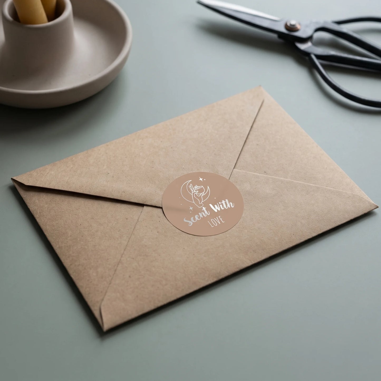 Scent With Love Mystic Candle Hand Varikit sticker reading 'Scent with Love' sealing a translucent vellum envelope.