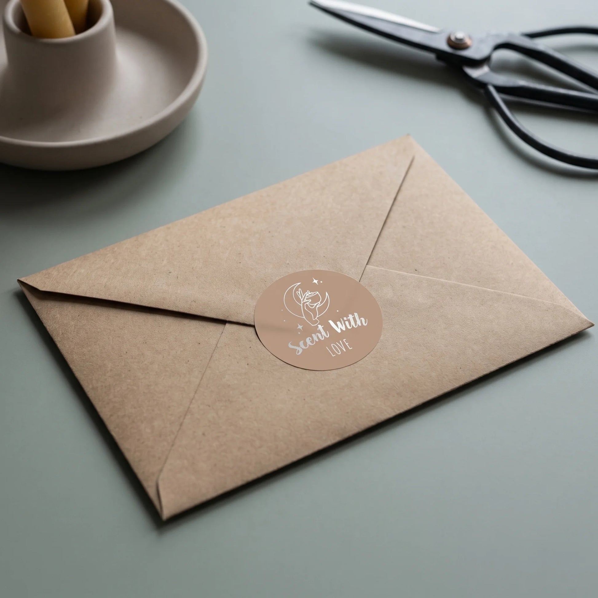 Scent With Love Mystic Candle Hand Varikit sticker reading 'Scent with Love' sealing a translucent vellum envelope.