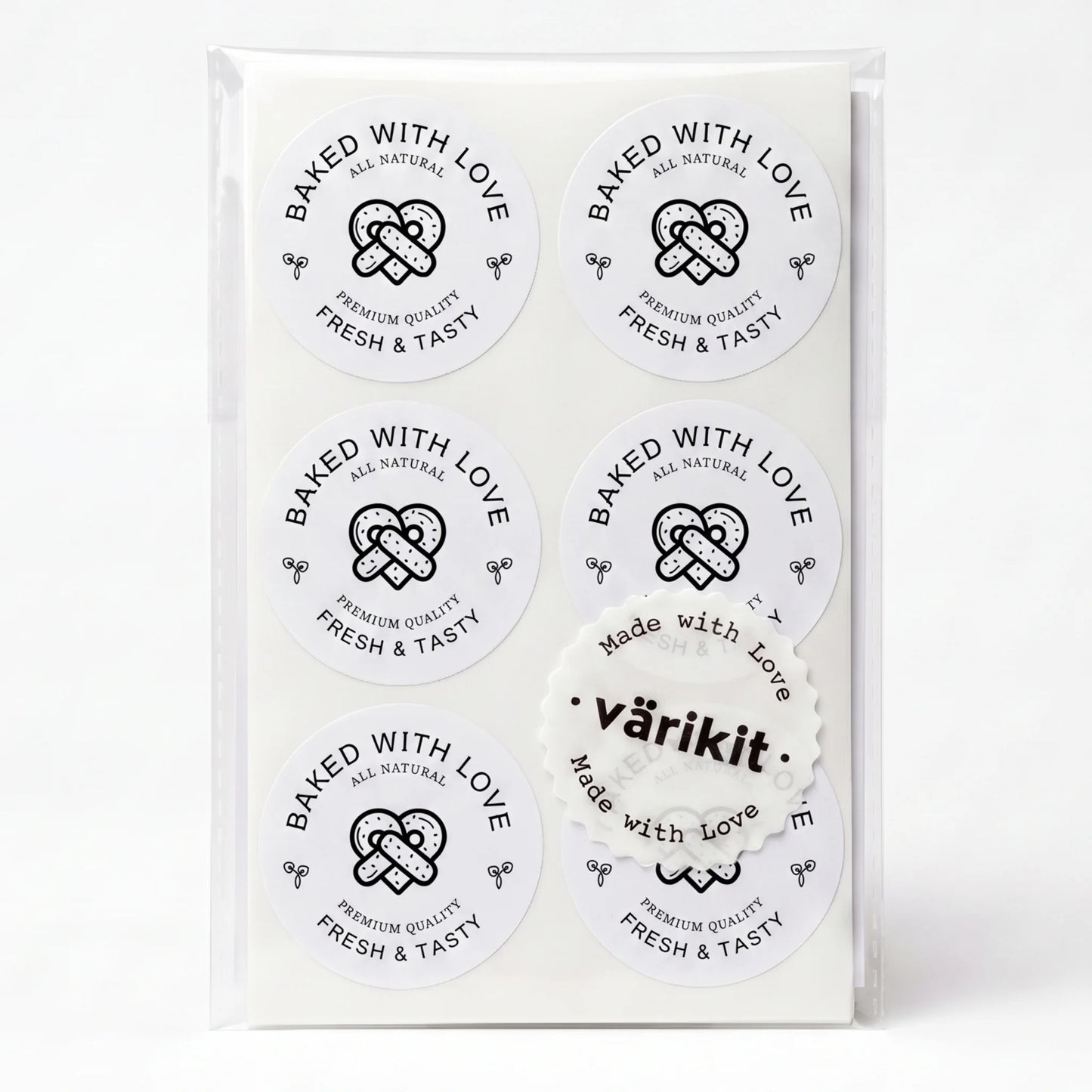 black ink on white paper, 2-inch round food packaging, baked with love lettering.