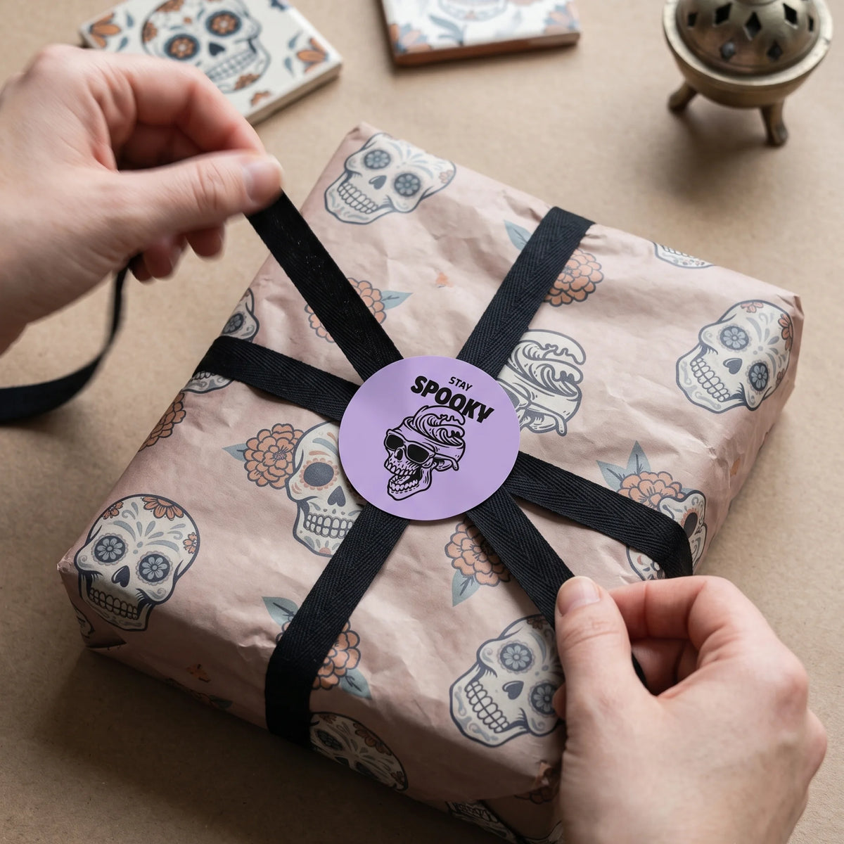 A skull and wave graphic finishing the unboxing experience with playful attitude.