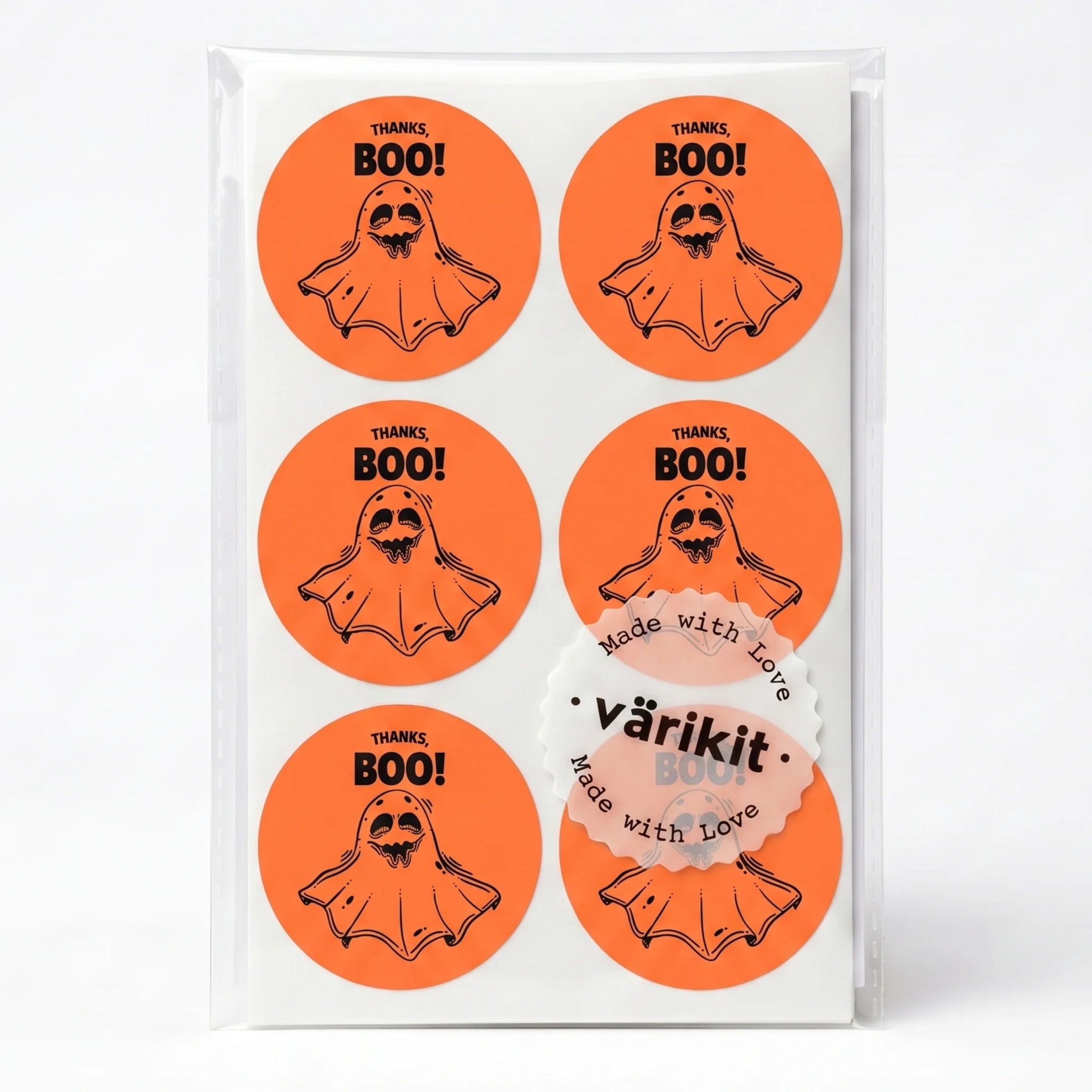 black ink on orange paper, 2-inch round spooky packaging labels, friendly cartoon ghost.