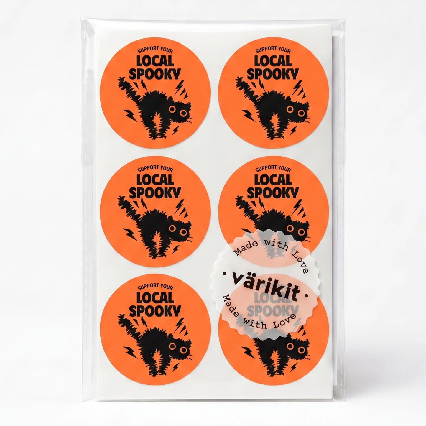 black ink on orange paper, 2-inch round spooky packaging labels, startled cat with lightning.