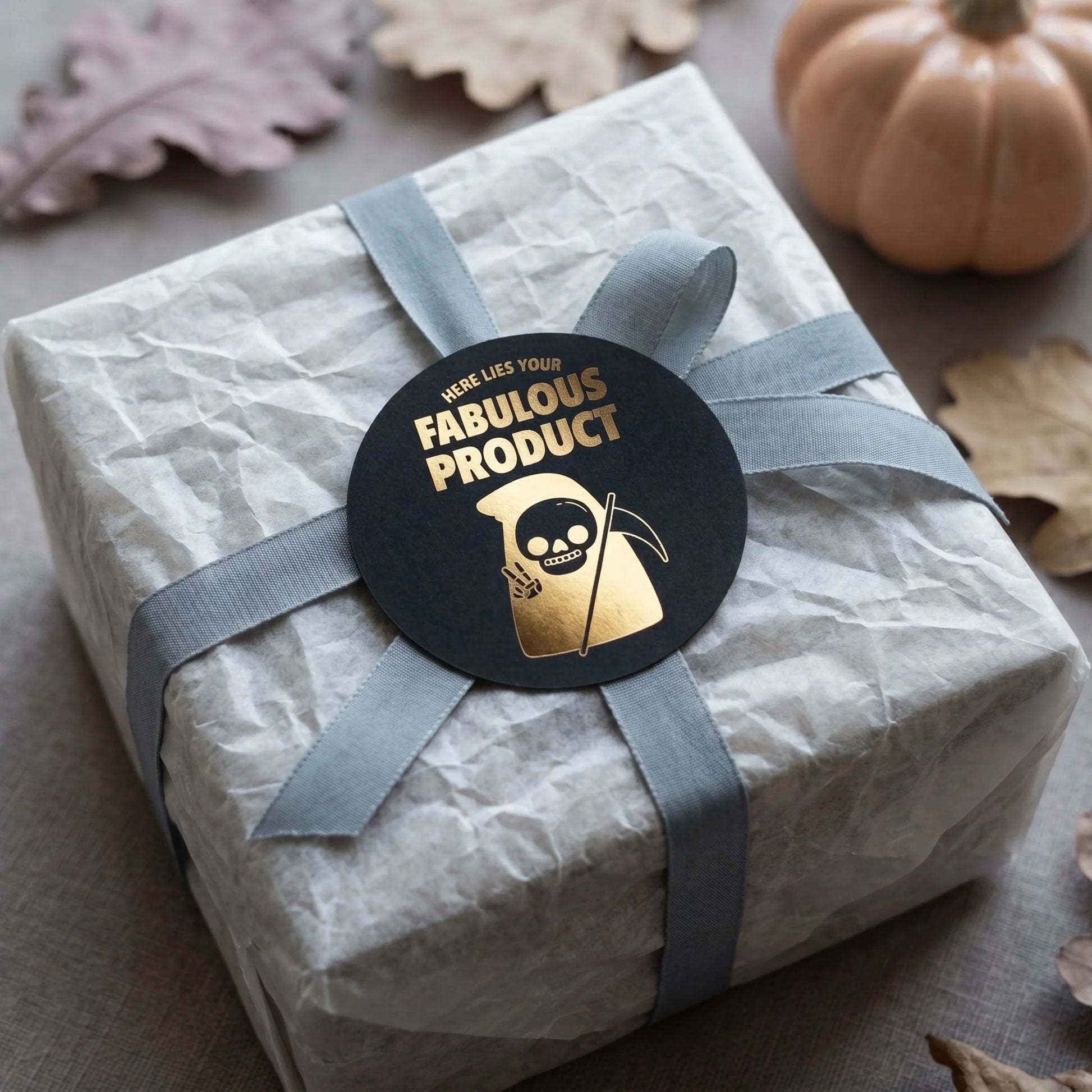 A Grim Reaper peace sign graphic finishing the unboxing experience with playful irony.