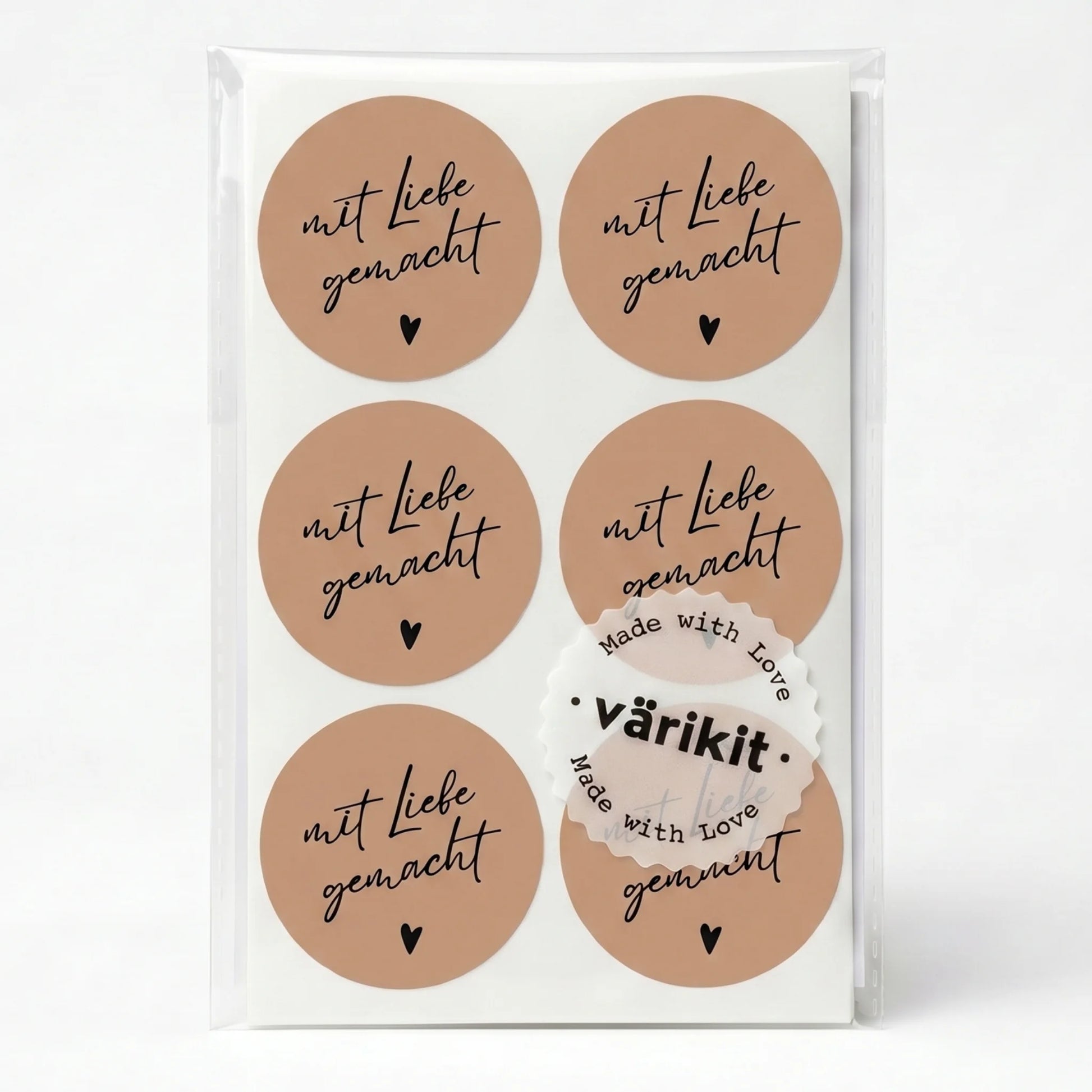 Set of round stickers with 'mit Liebe gemacht' text on a white background